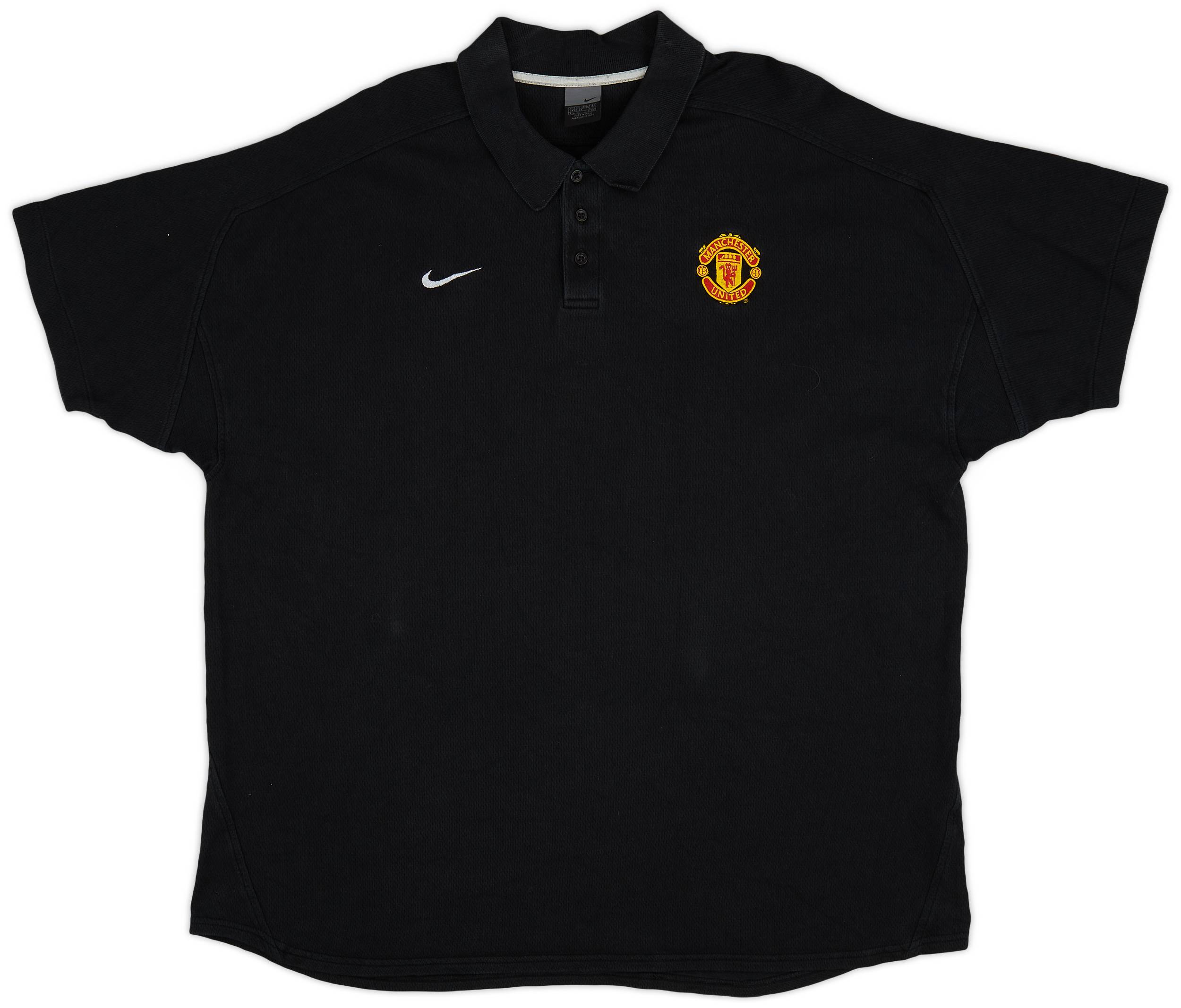Manchester united black polo shirt shop